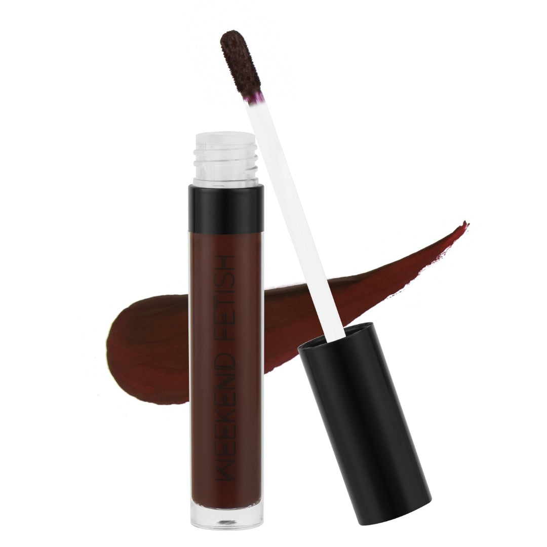 Weekend Fetish Matte Liquid Lipstick in Brick Housety, a deep red shade.