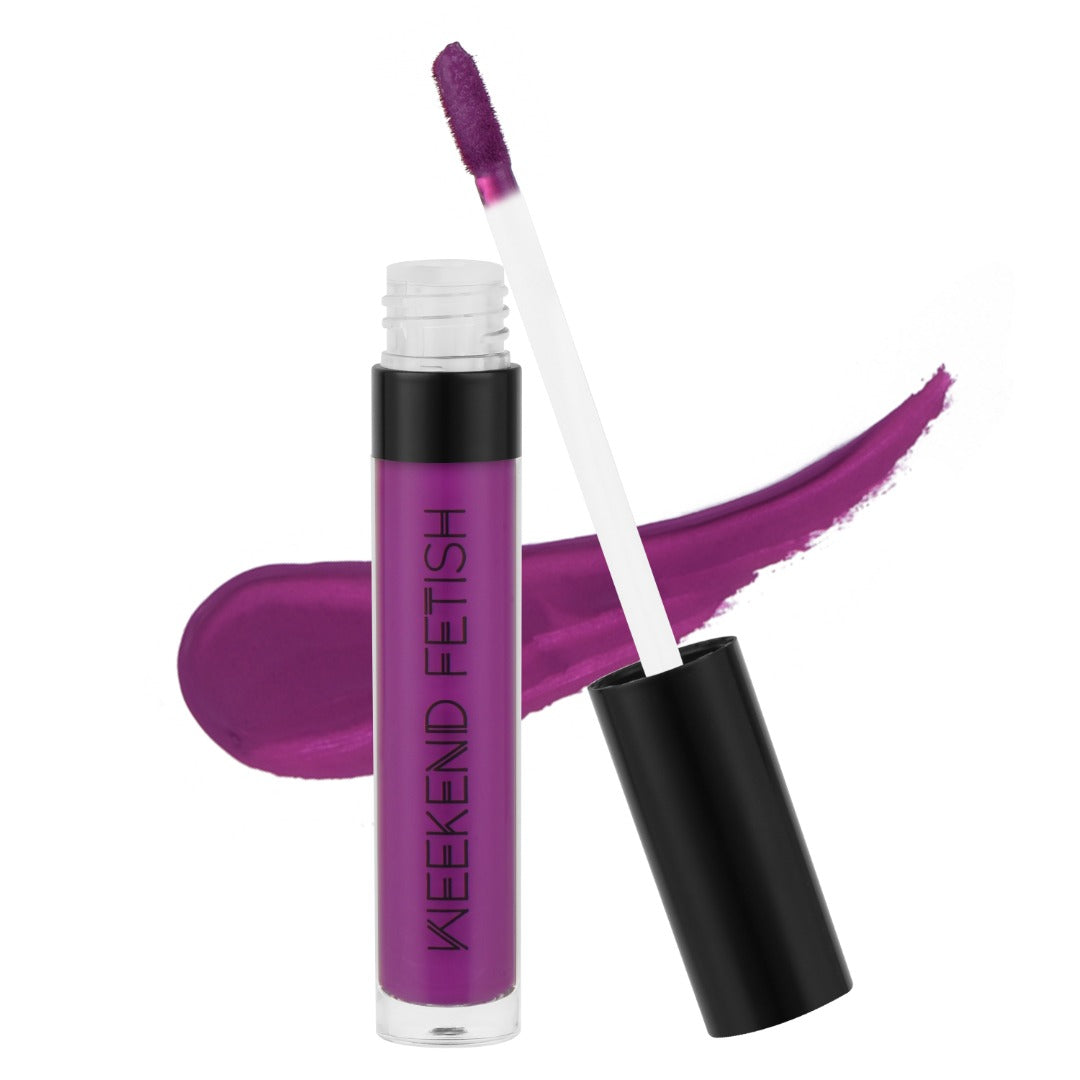 Weekend Fetish Matte Liquid Lipstick in Dare Me, a bold purple shade.